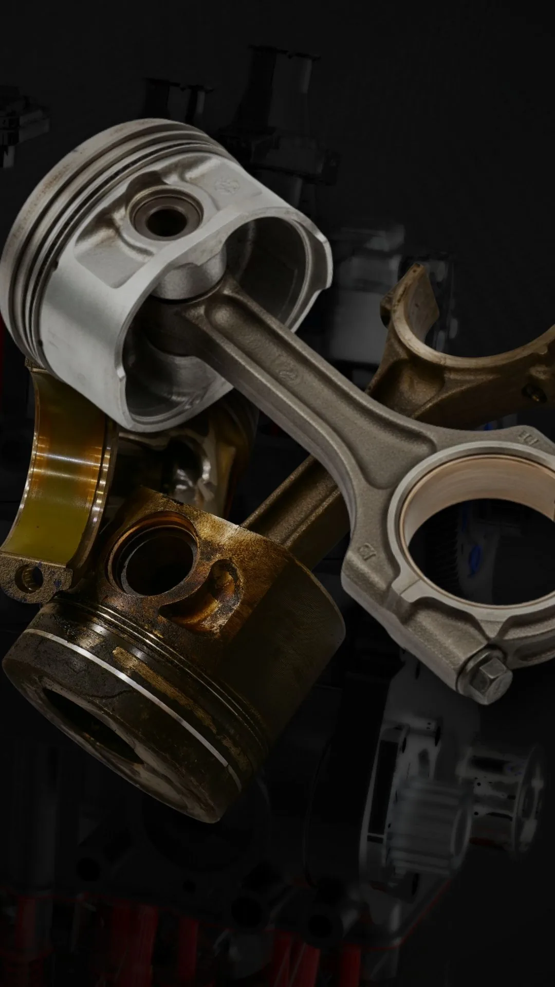 Worn piston and bearing shell from an EA189 engine